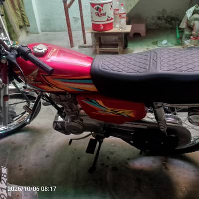 honda  125.03054076402