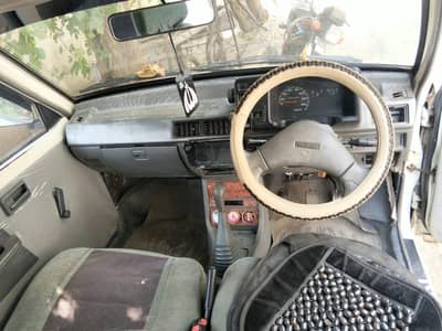 Suzuki Mehran VXR 2010 [. 3.2. 1.8. 4.5. 2.4. 0.6. ]