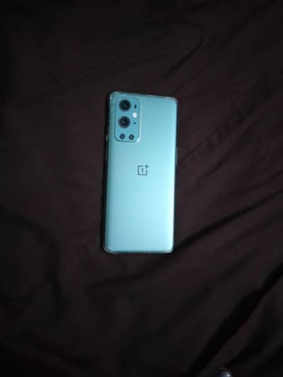 One Plus 9 Pro single sim approved 12gb Ram 256gb memory back damag