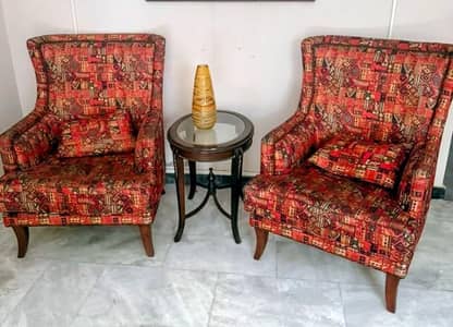 Two chairs with table