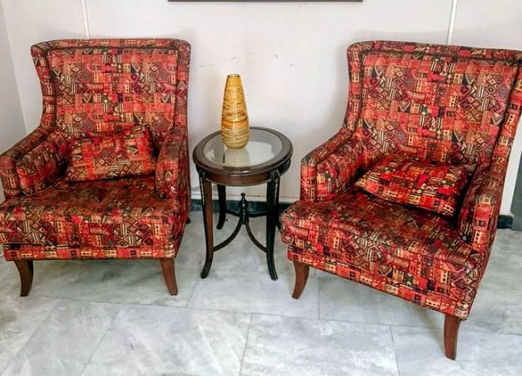 Two chairs with table 0