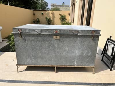 Trunk and wooden rack