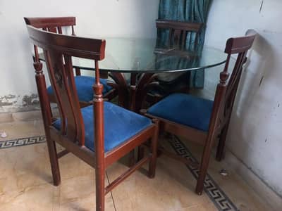 Dinning table with wooden chairs