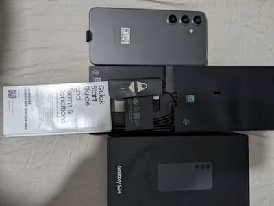 Samsung Mobile S24 sim lock new phone not use. just box open