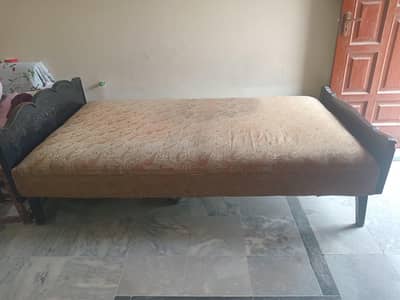 wooden single bed