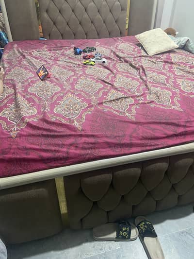Bed with side table and spring mattress available