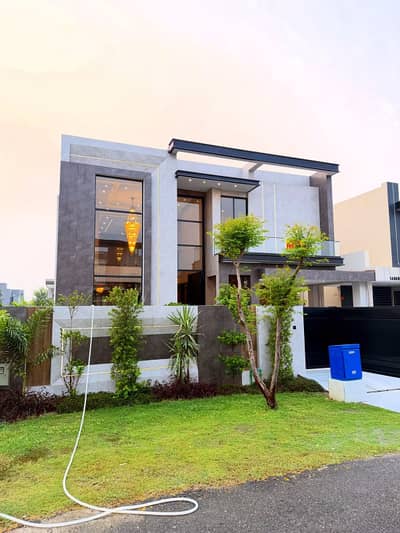 One Kanal Brand New Luxury Ultra-Modern Design Most Beautiful Bungalow 2 Servant Quarter In Basement For Sale At Prime Location Of DHA Lahore Near To Park Masjid & Commercial Market.