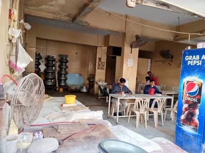 HUGE SHOP AVAILABLE FOR RENT NEAR TO MAIN RASHID MINHAS ROAD