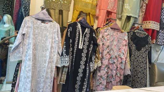 "Clothing Stock Clearance Sale – Shop Closed"