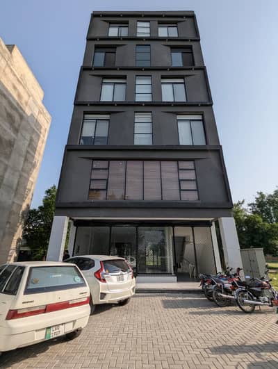 Brand New Commercial Plaza with Modern Elevation For Sale With 6 Lac Rental Income located on 100 Ft Main Road Nishtar Block Sector E Bahria Town Lahore