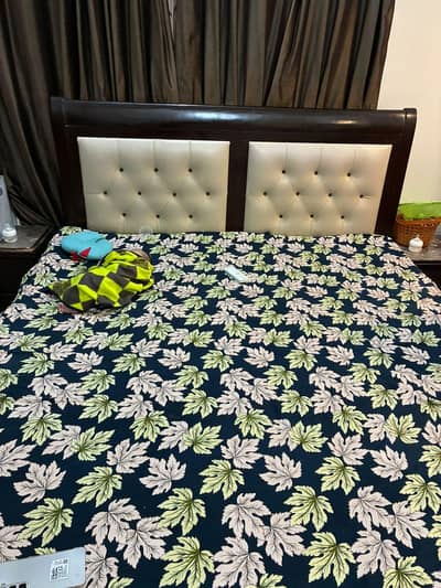 bed with dressing and side table