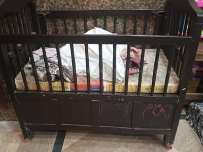 Wooden baby cot