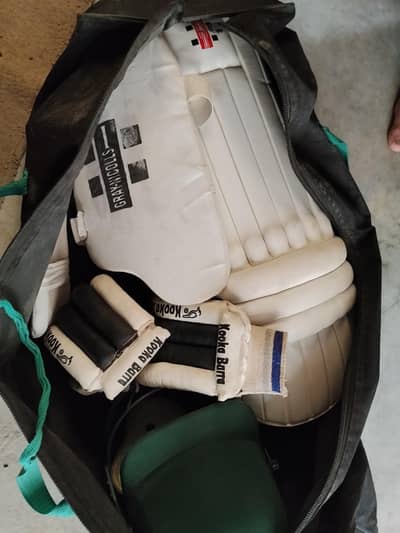 complete hard ball cricket kit - pads Gloves and helmet used condition