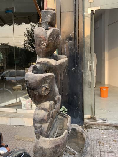 Cement fountain decor item