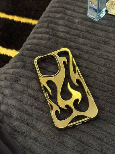 It is Golden Colour new IPhone 16 pro max Cover .