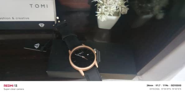 tomi black strap watch