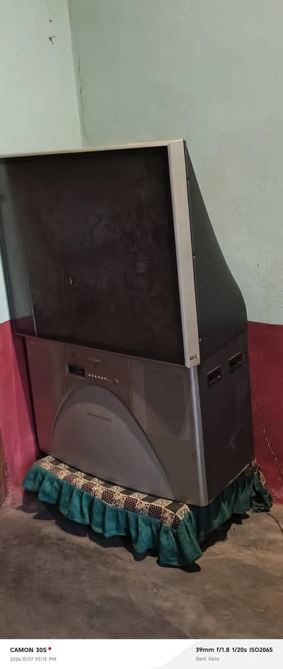 big size TV an DVD and small TV and washing machine