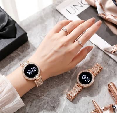 DIGITAL WATCH FOR WOMEN WITH GOLD STRAP WATHSAPP 03004702477
