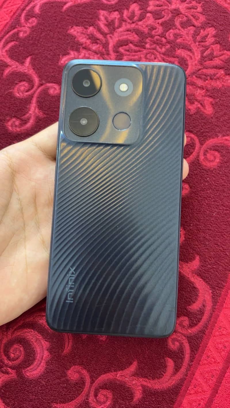 Infinix Smart 7 6
