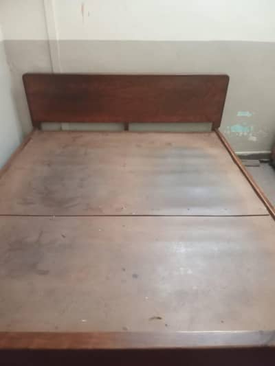 wooden bed .