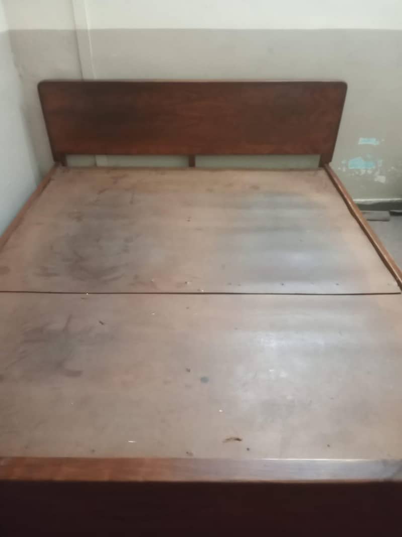 wooden bed . 2