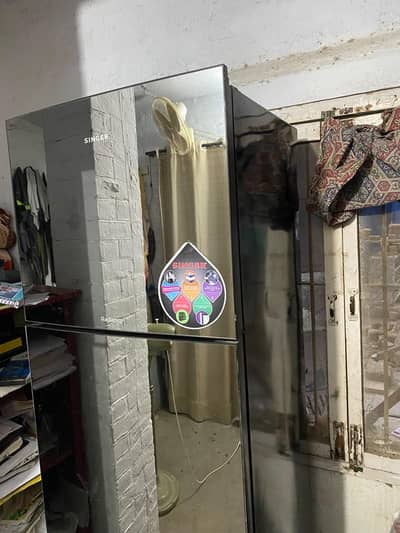 singer company refrigerator is for sale