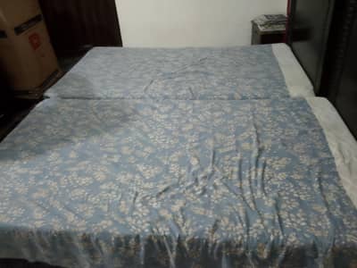 two single bed with two side table