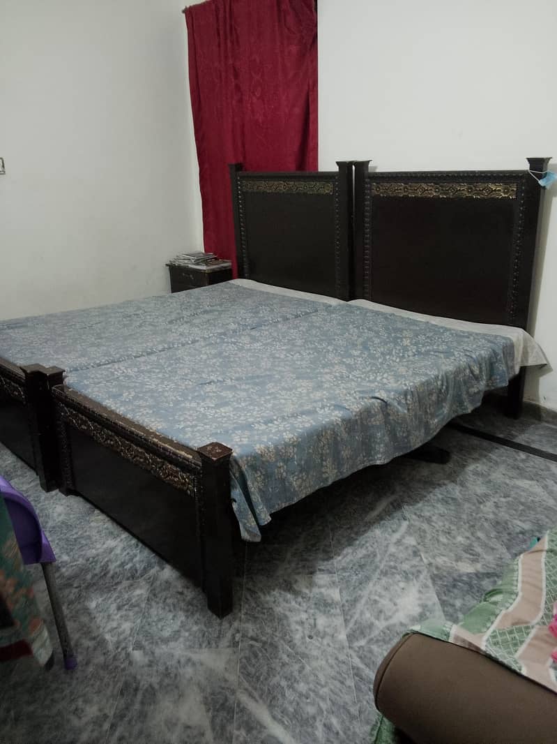 two single bed with two side table 1