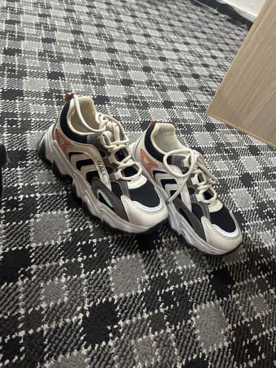 8 pair of shoes in the size 36