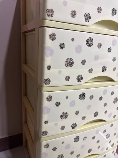 Light brown 5 draws cupboard
