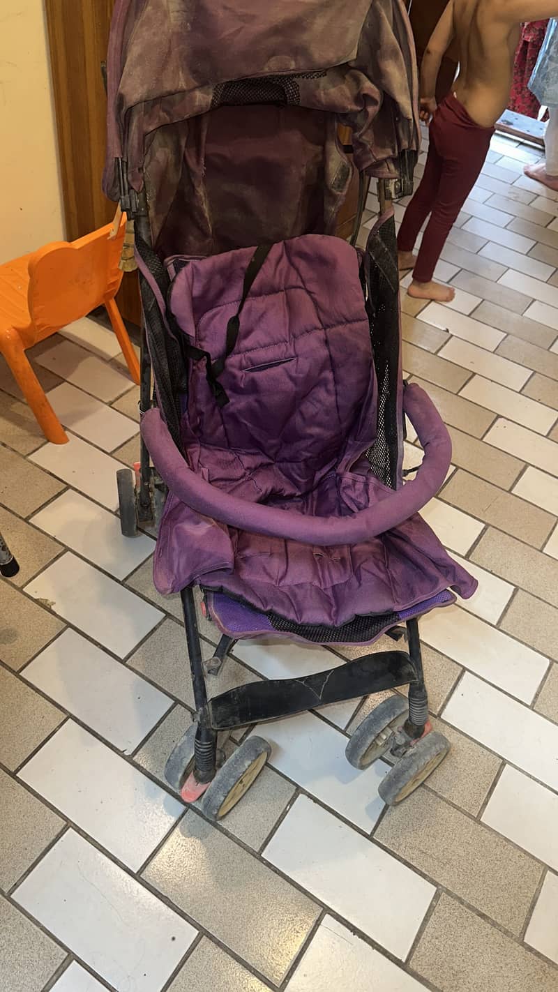 Purple stroller. 1