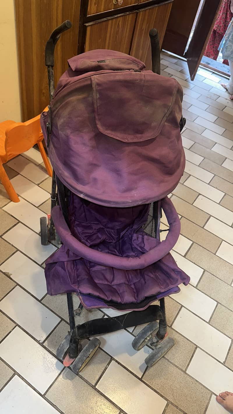 Purple stroller. 2
