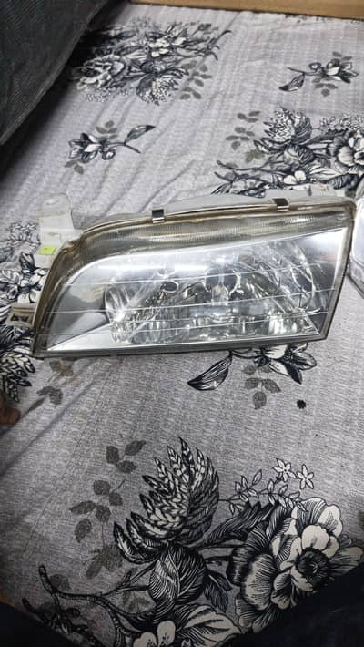 indus carolla 1994/2000 headlight with indicator
