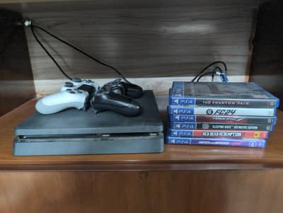PS4 Slim Sealed 1 TB with 5 Games