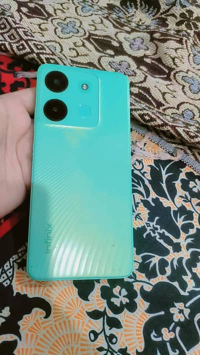 Infinix Smart 7 model.   4 / 64 memory