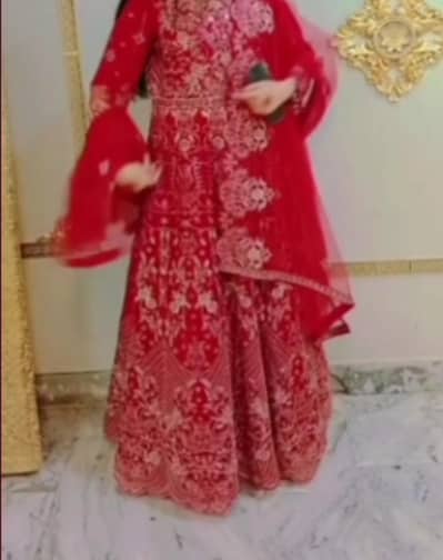 beautiful red dress with sitara work and embroided net dupatta