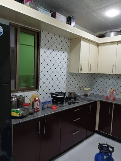 Gulshan Iqbal Block 1 Portion For Rent 3 Bed DD 1st Floor 240 Square Yards Rent Demand 1 Lac 25000 Like Brand New Portion