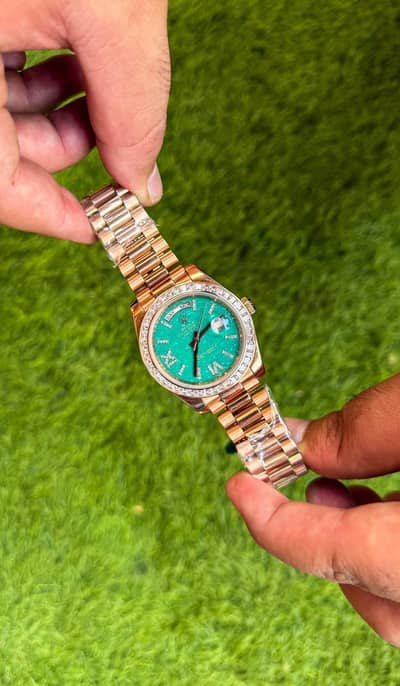 Rolex Day-Date featuring rose gold automatic
