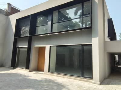 GULBERG ESTATE OFFER,6000 SQFT COMMERCIAL BUILDING FOR RENT MAIN BOULEVARD & MM ALAM ROAD GULBERG LAHORE