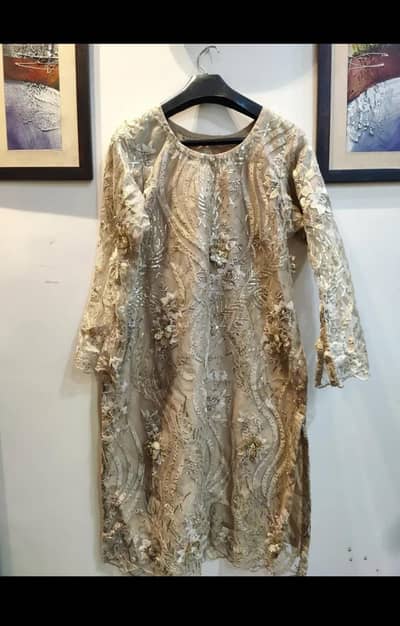 Heavily embroided Golden dress
