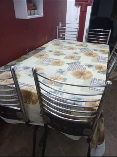 Glass dining table with 6 wooden chairs