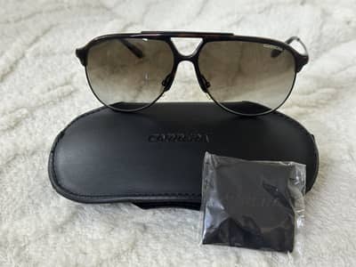 Prada, Carrera and Tom ford sunglasses