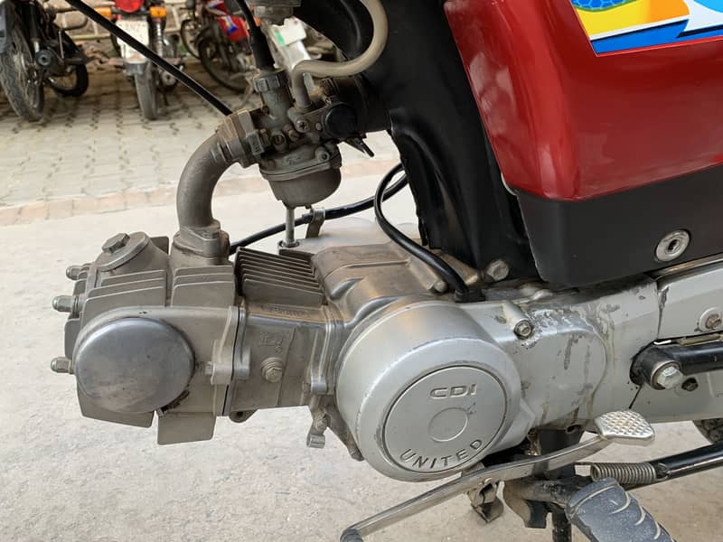 United 70cc 4