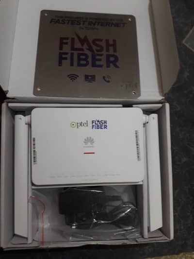 PTCL  FLASH FIBER ROUTER DABBA PACK USED ONLY A MONTH  SEE THE  PICTUR