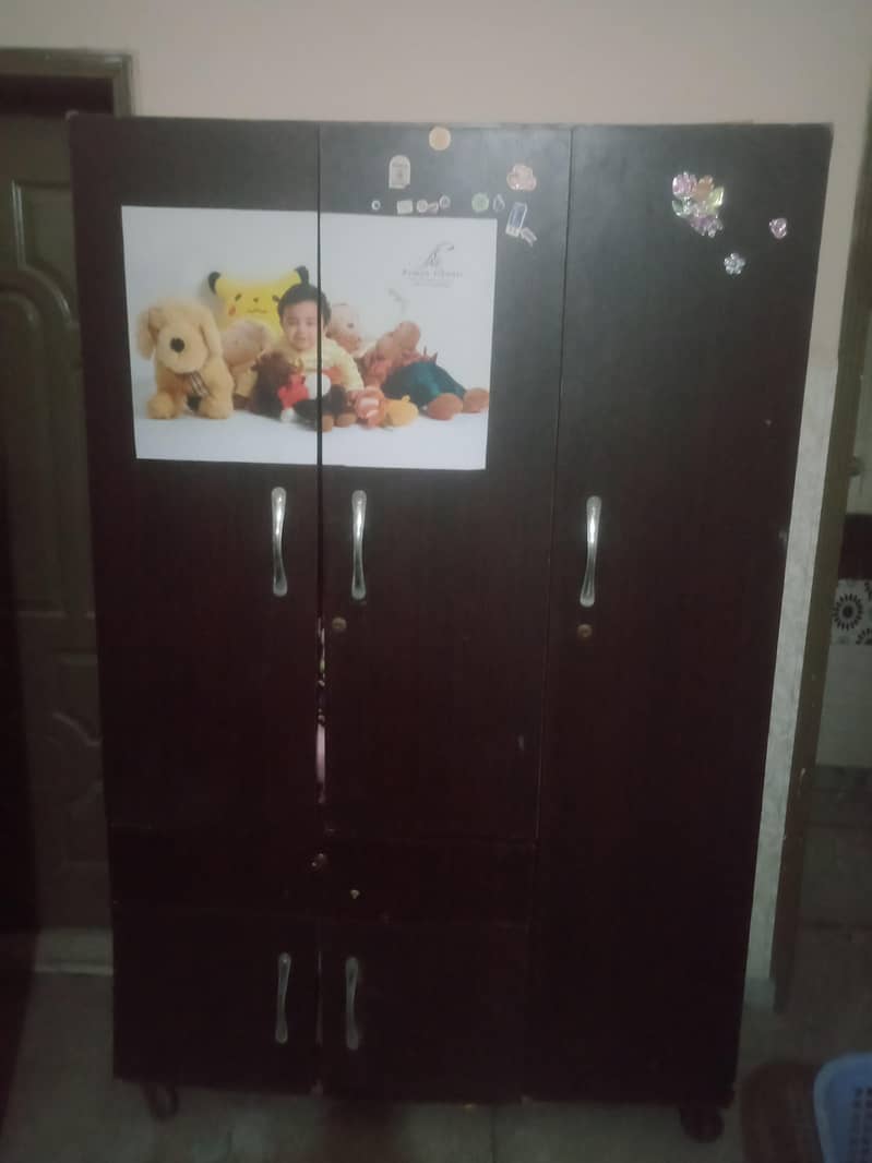 cupboard three door 0