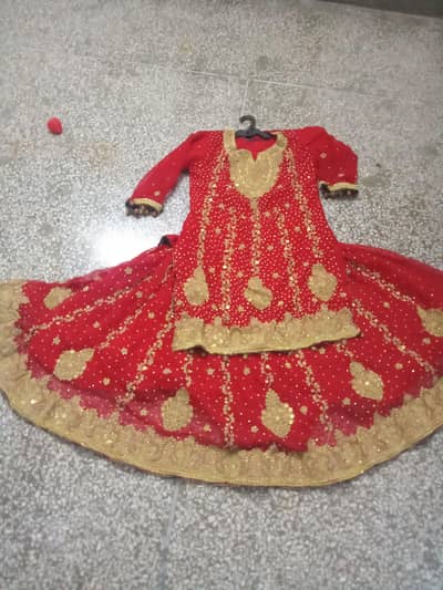 Red and golden pridal dress lehenga medium size 10000 rawalpinde