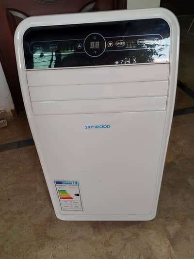 sky/wood . imported portable air conditioner. 10/10 condition
