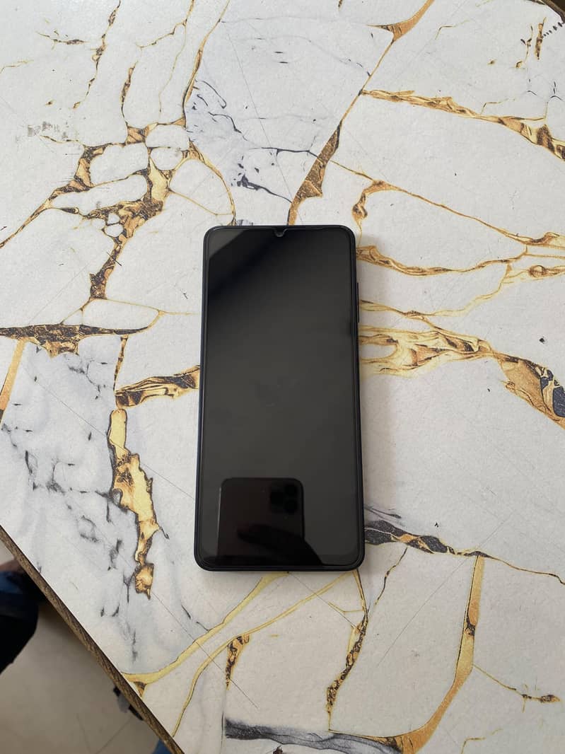Samsung Mobile A06 1