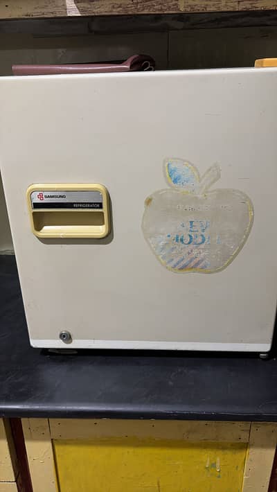 Old but genuine mini fridgebest for room and short spaces