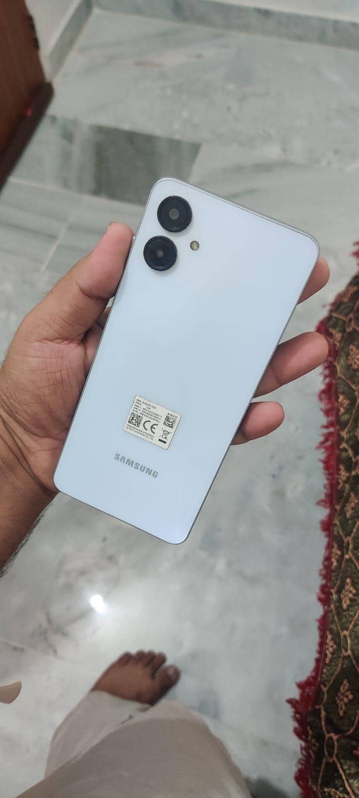 Samsung Mobile A06 9